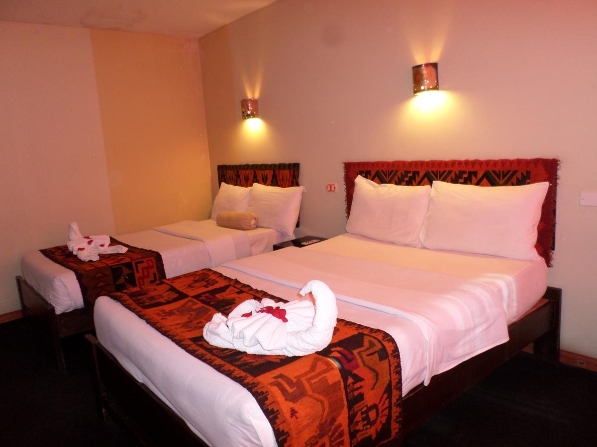 New Day Machu Picchu Hotel Aguas Calientes ภายนอก รูปภาพ